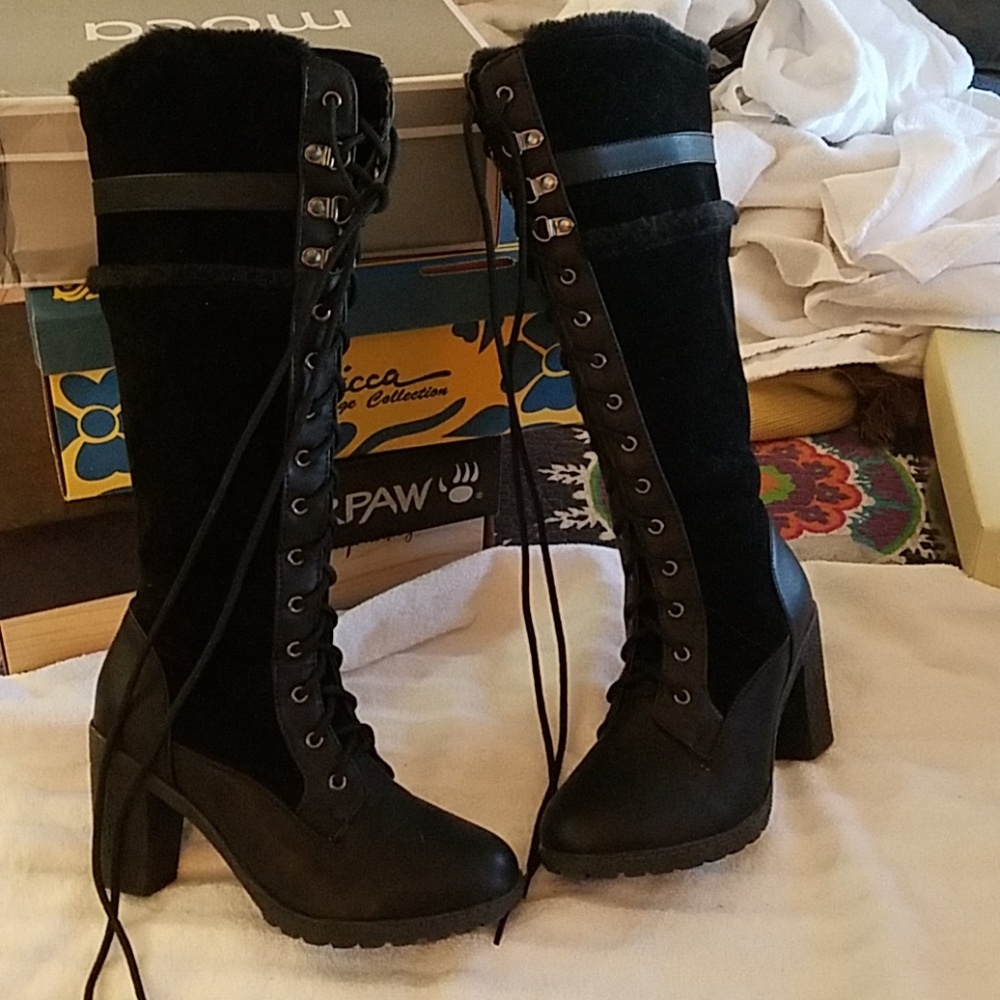 Knee high heeled boots